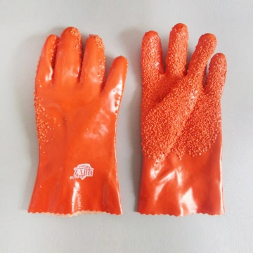 Orange PVC gloves with chips on the palm